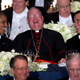President Barack Obama, left, and Republican presidential candidate, former Massachusetts Gov. Mitt Romney, with Cardinal Timothy Dolan during the Archdiocese of New York’s 67th Annual Alfred. E. Smith Memorial Foundation Dinner Oct. 18, 2012, at the hotel.